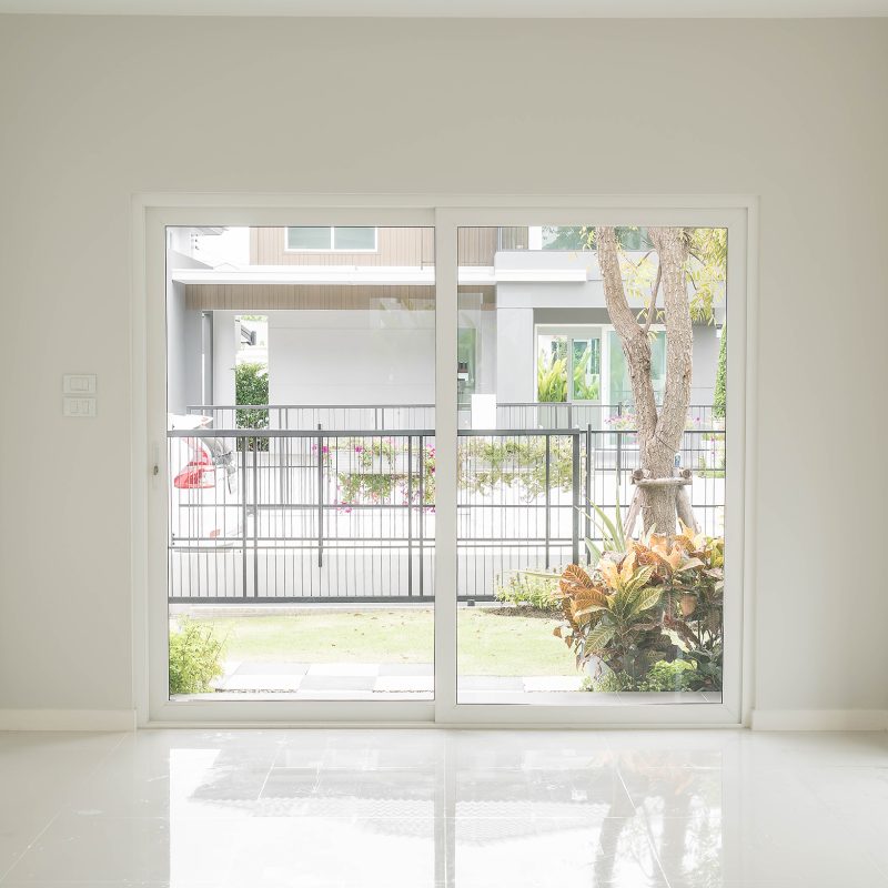 empty glass door in living room interior background